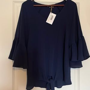 Free as a Bird | Navy ruffle flared sleeve top